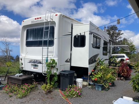 Photo of 92-1520 Luau Dr, Ocean View, HI 96737 (MLS # 716404)