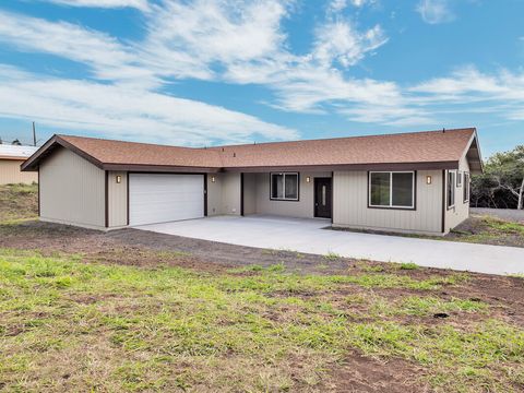 Photo of 94-1679 Kaulua St, Naalehu, HI 96772 (MLS # 719318)
