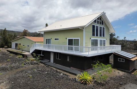 Photo of 92-8489 Macadamia Dr, Ocean View, HI 96737 (MLS # 720340)