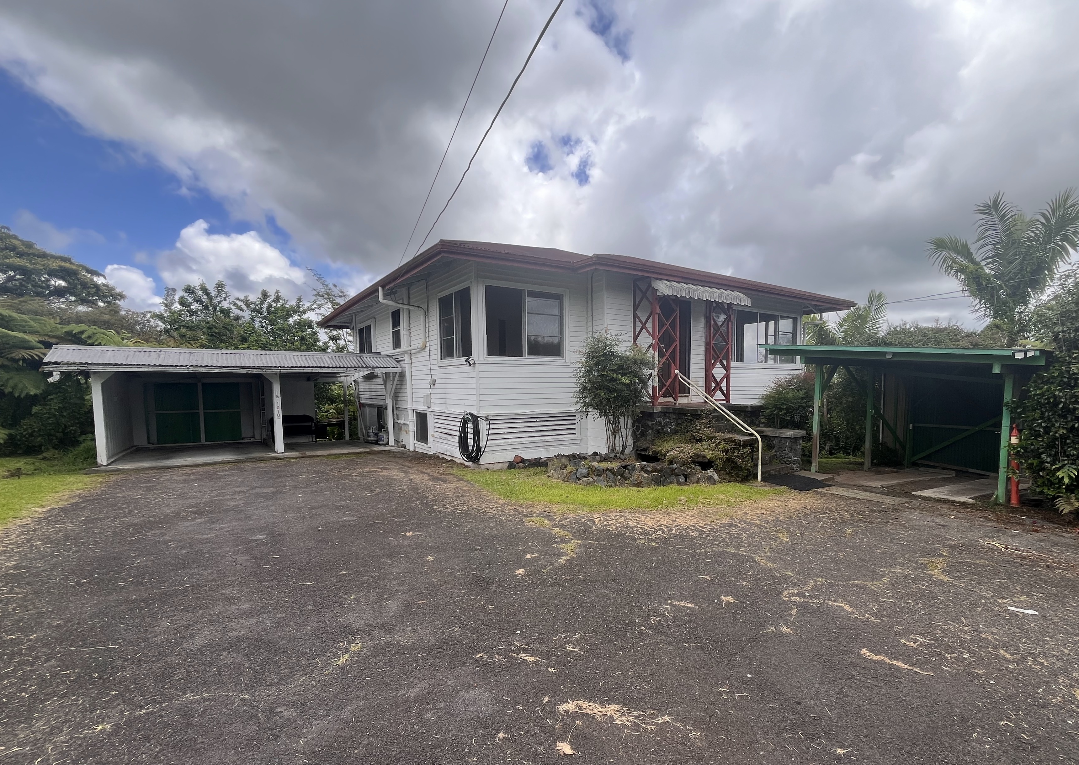 Home has lots of charm & lower enclosed area, look at all the garage space too.