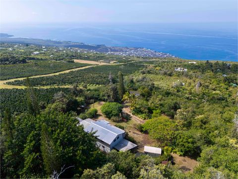 Photo of 88-1584 Papio Dr, Captain Cook, HI 96704 (MLS # 726554)