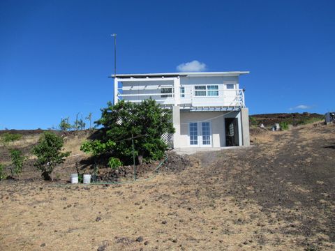 Photo of 92-8636 Menehune Dr, Ocean View, HI 96737 (MLS # 717275)