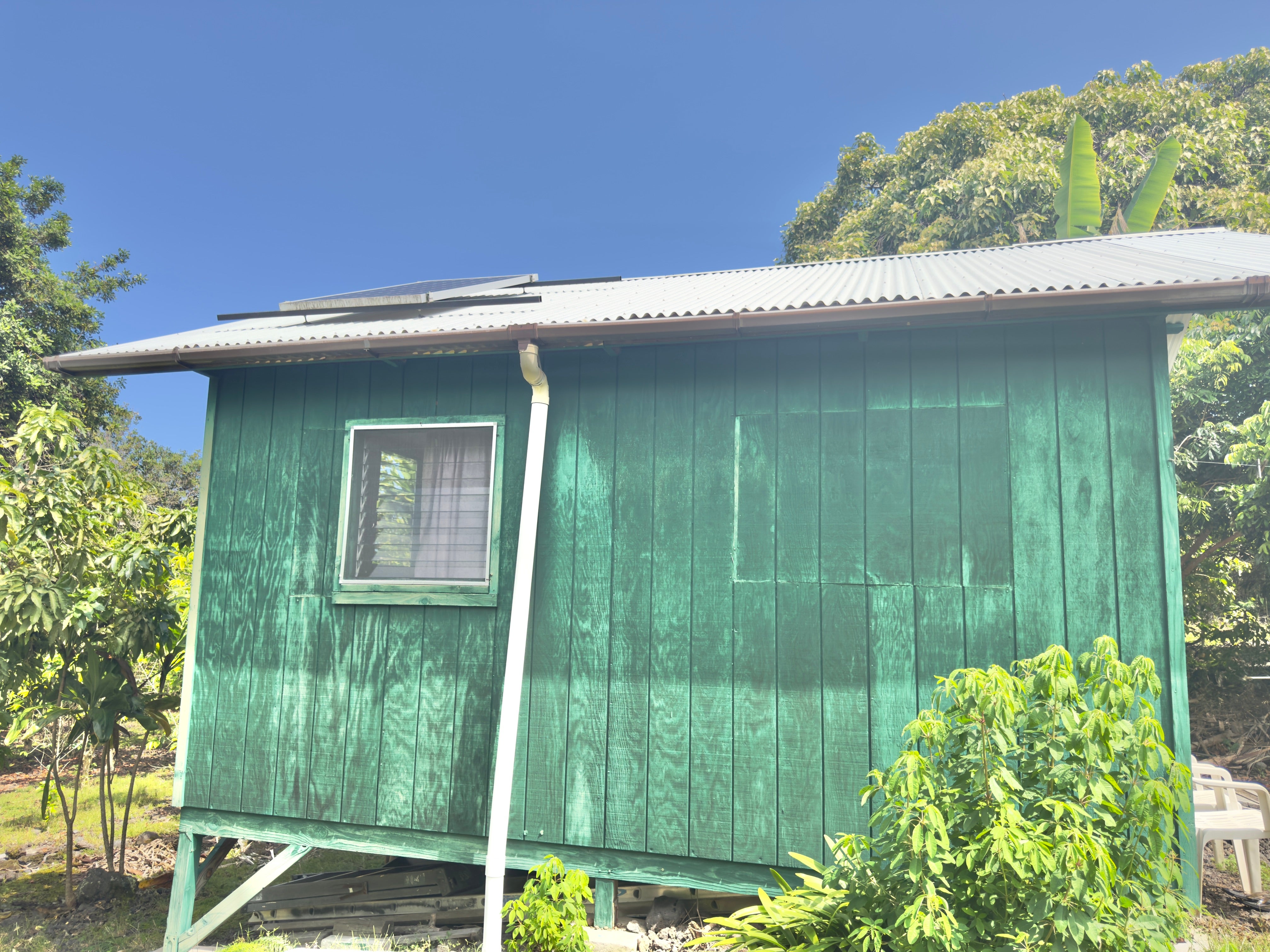1 bedroom 1 bath unpermitted cabin with solar on 5 acre farm.