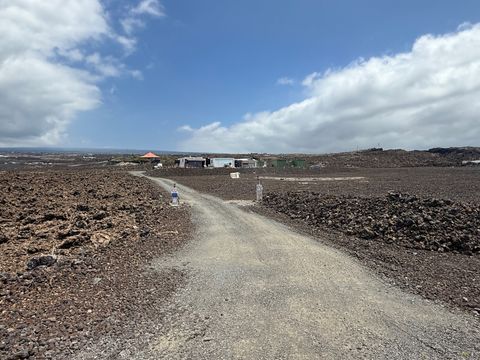 Photo of 92-8334 Poko Dr, Ocean View, HI 96737 (MLS # 726097)