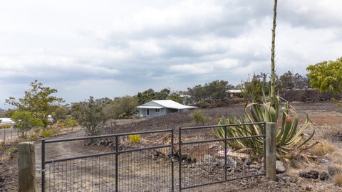 Photo of 92-8215 Bamboo Ln, Ocean View, HI 96737 (MLS # 734022)
