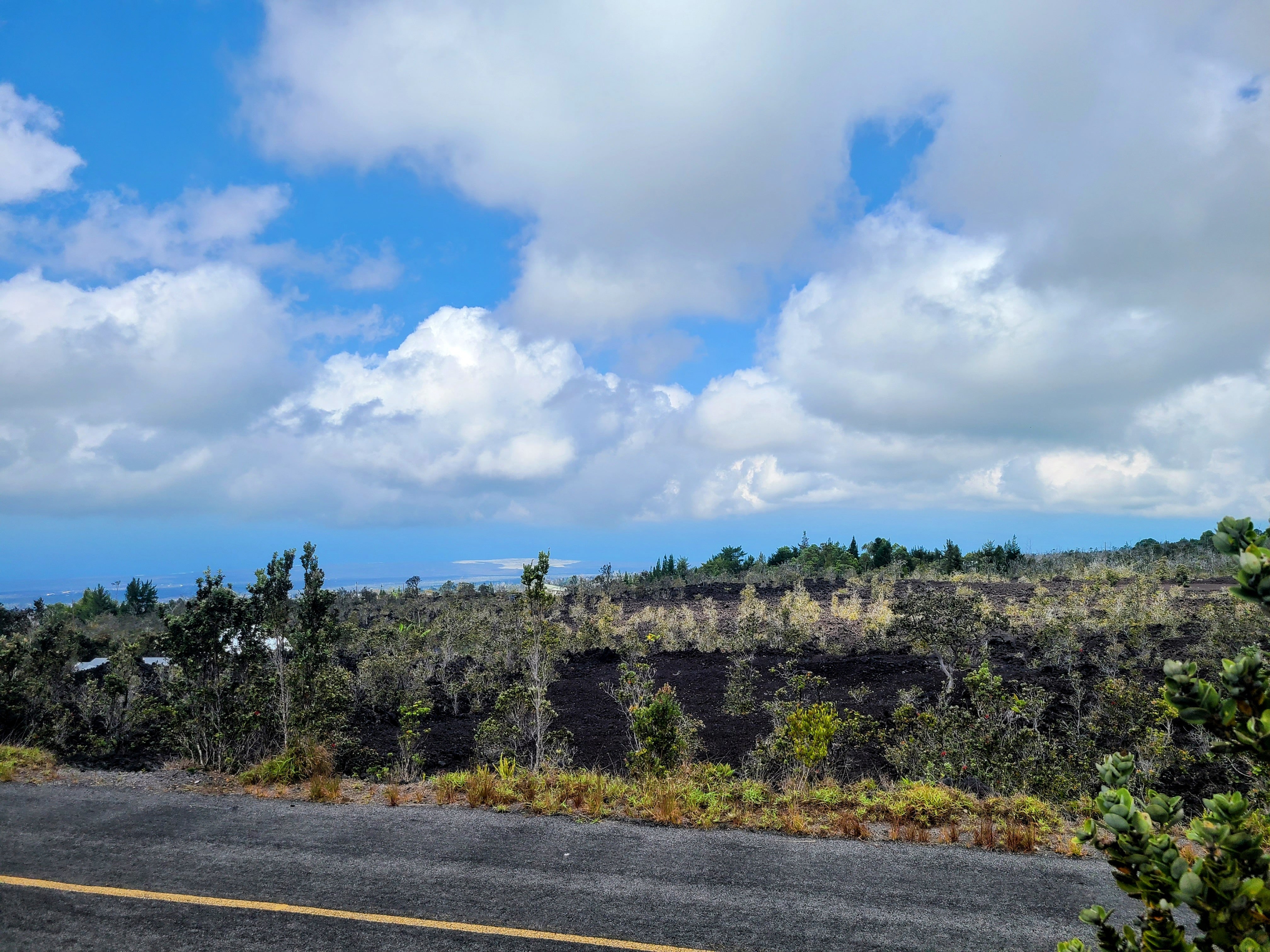 View of the ocean and coastline standing on the front of the lot.