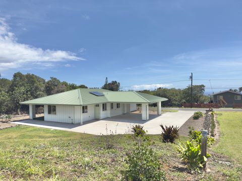 Photo of 94-5763 Awa Pae Pl, Naalehu, HI 96772 (MLS # 720265)