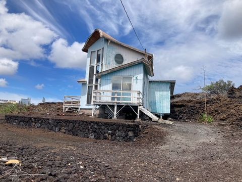 Photo of 92-8318 Lauhala Dr, Ocean View, HI 96737 (MLS # 729182)