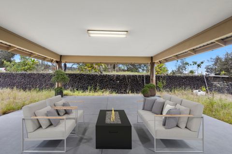 Photo of 92-9039 Ginger Blossom Ln, Ocean View, HI 96737 (MLS # 725257)