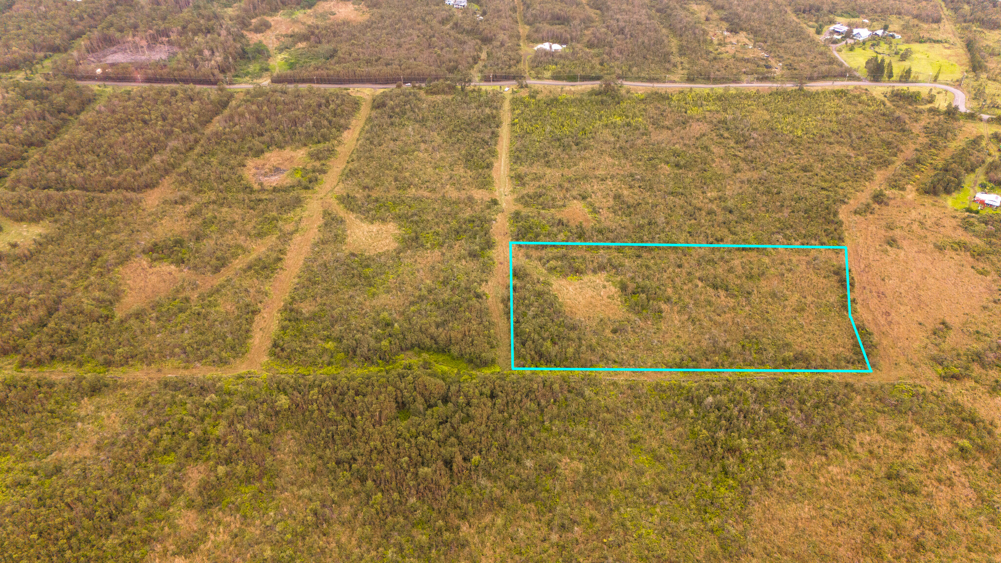 Backs up to State land and Old Volcano Trail. Nicely shaped. House site partially prepped.