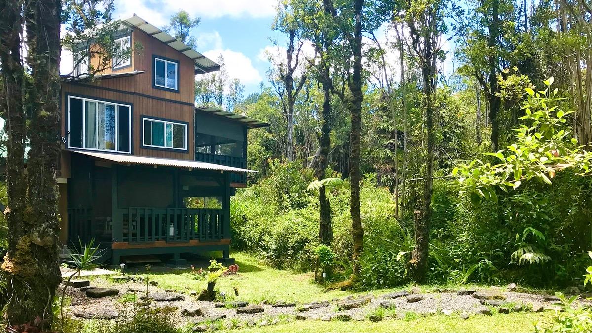 Lava Rock walkway and garden path connects the cabins. Relax and enjoy the rainforest and garden views in the covered lanai.