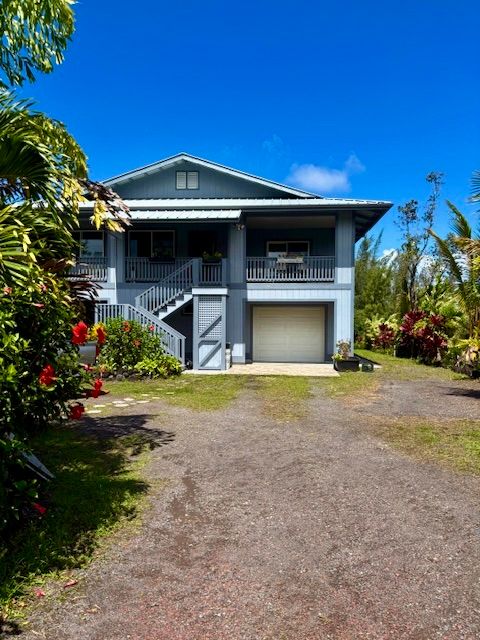 Photo of 15-1051 Kiawe Rd, Keaau, HI 96749 (MLS # 728820)