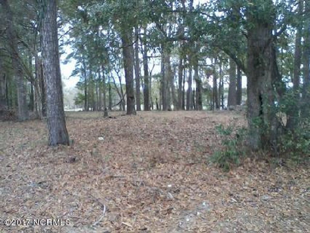 Photo of 7 Lakeshore Drive, Sunset Beach, NC 28468 (MLS # 100053006)
