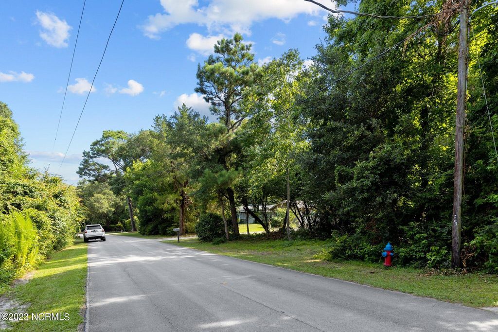 Photo of 149 Arborvitae Drive, Pine Knoll Shores, NC 28512 (MLS # 100396196)