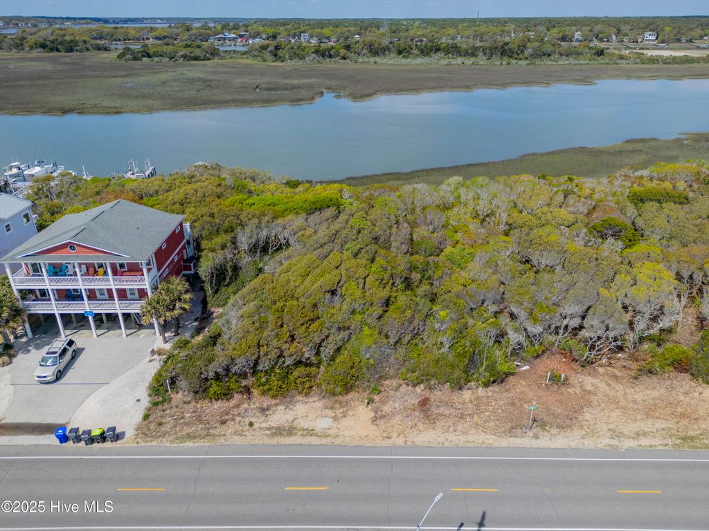 Photo of 6 West Beach Drive, Oak Island, NC 28465 (MLS # 100529228)