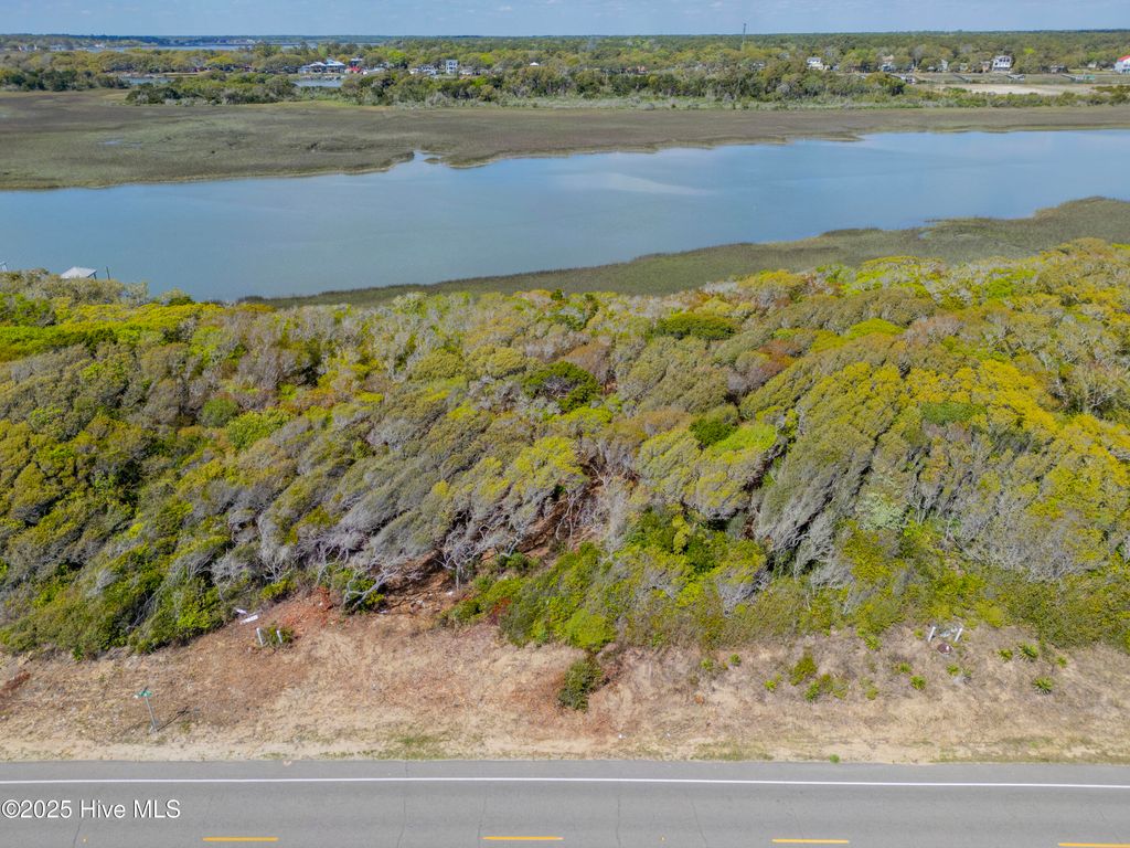 Photo of 6 West Beach Drive, Oak Island, NC 28465 (MLS # 100529228)