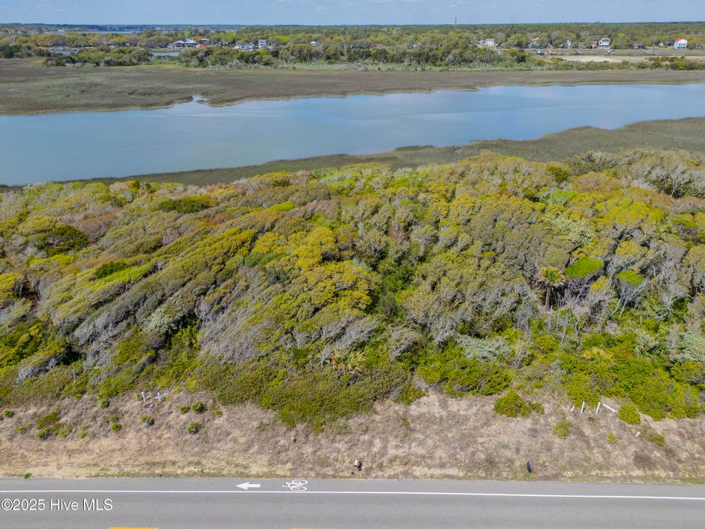 Photo of 6 West Beach Drive, Oak Island, NC 28465 (MLS # 100529228)