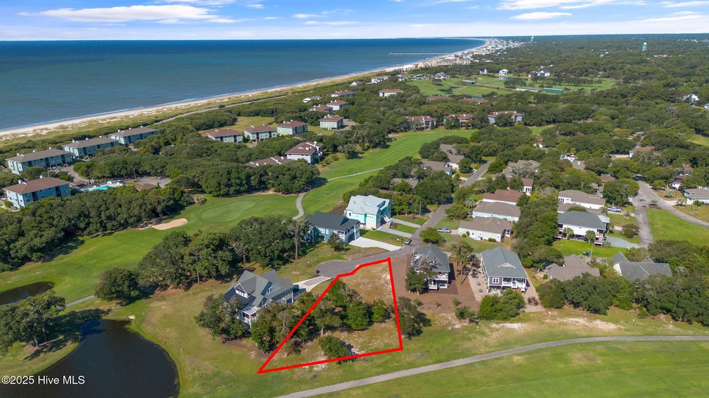 Photo of 184 Ryder Cup Way, Caswell Beach, NC 28465 (MLS # 100520365)
