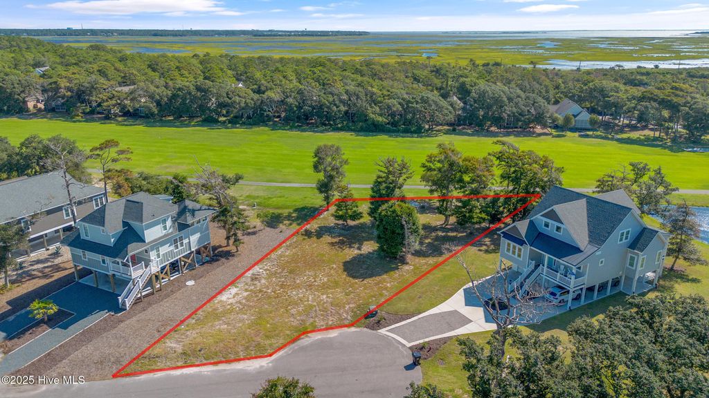Photo of 184 Ryder Cup Way, Caswell Beach, NC 28465 (MLS # 100520365)