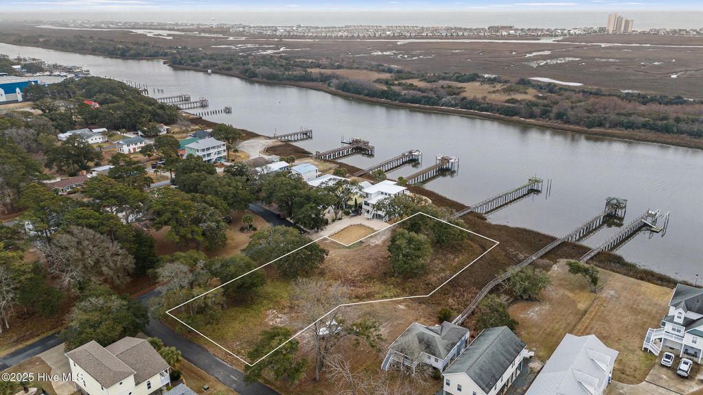 Photo of 2016 Camelot Drive SW, Ocean Isle Beach, NC 28469 (MLS # 100536072)