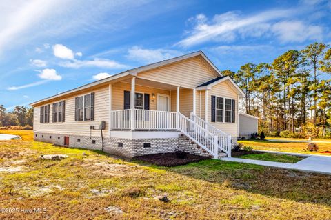 Photo of 853 Yaupon Drive SW, Calabash, NC 28467 (MLS # 100543409)