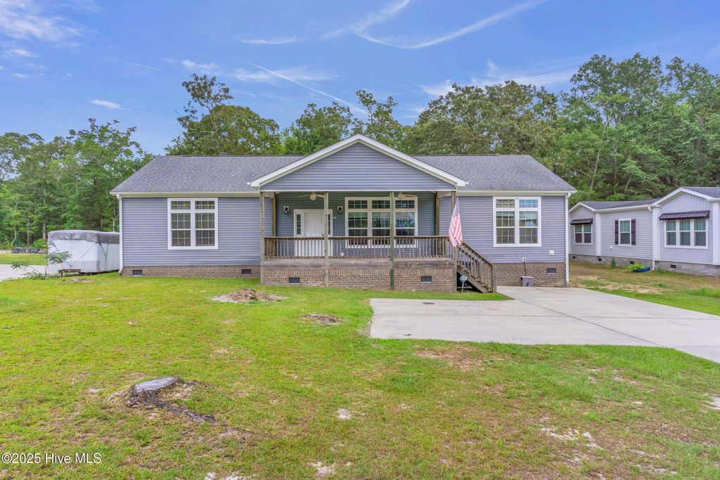 Photo of 503 Cloe Dare Drive SW, Shallotte, NC 28470 (MLS # 100523866)