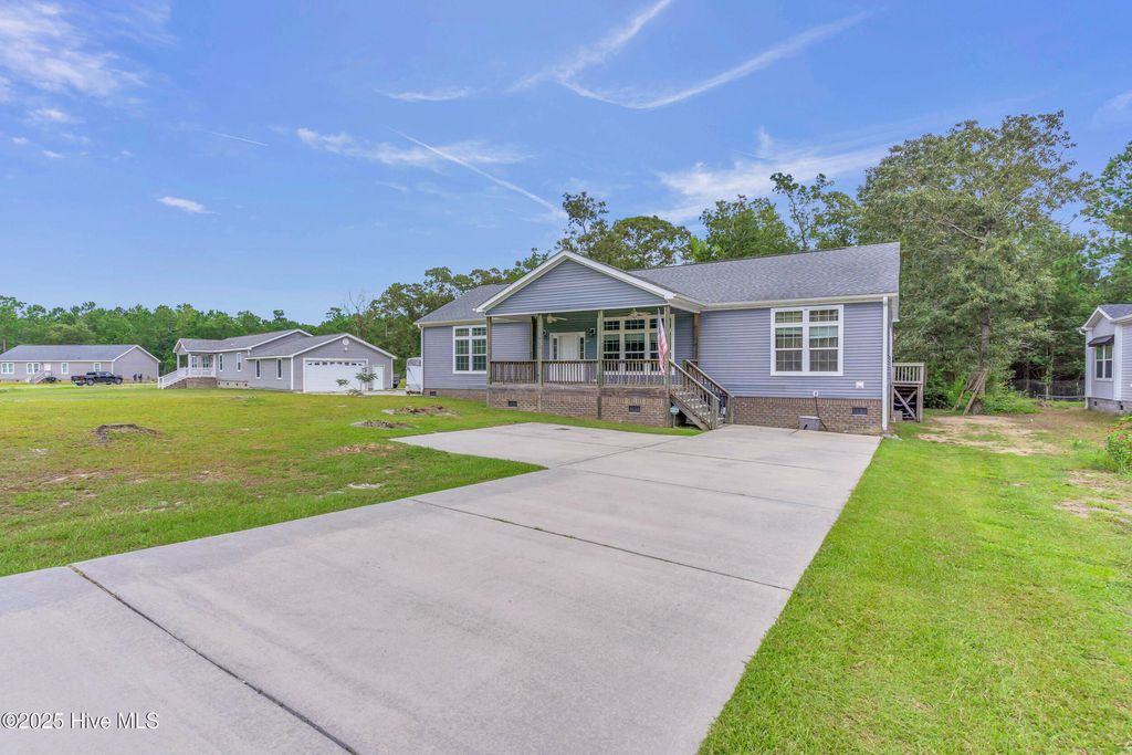 Photo of 503 Cloe Dare Drive SW, Shallotte, NC 28470 (MLS # 100523866)