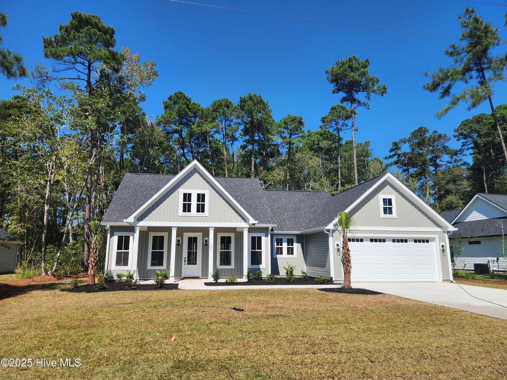 Photo of 484 Oakwood Drive NW, Calabash, NC 28467 (MLS # 100531452)