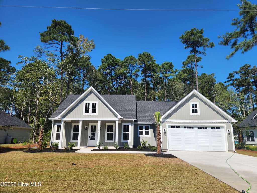 Photo of 484 Oakwood Drive NW, Calabash, NC 28467 (MLS # 100531452)