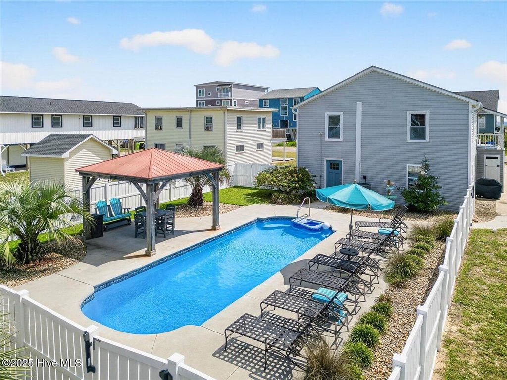 Photo of 1120 E Beach Drive, Oak Island, NC 28465 (MLS # 100527875)