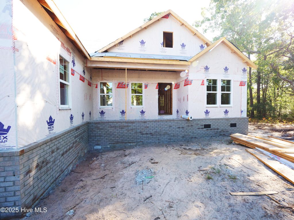 Photo of 3049 River Hills Drive SW, Shallotte, NC 28470 (MLS # 100483564)