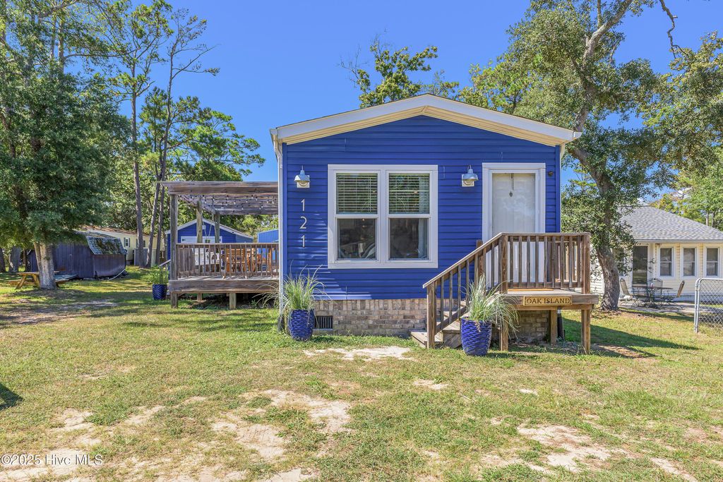 Photo of 121 NE 78th Street, Oak Island, NC 28465 (MLS # 100531553)