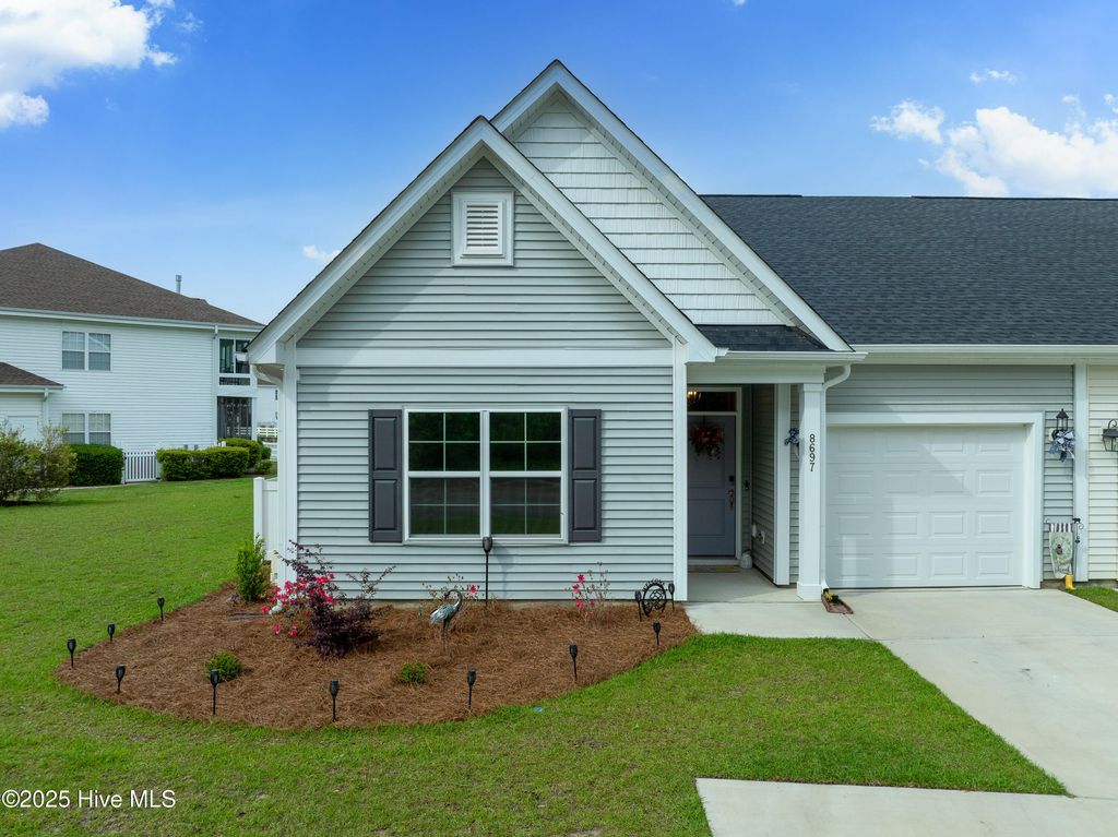 Photo of 8697 Radcliff Drive NW, Calabash, NC 28467 (MLS # 100499977)