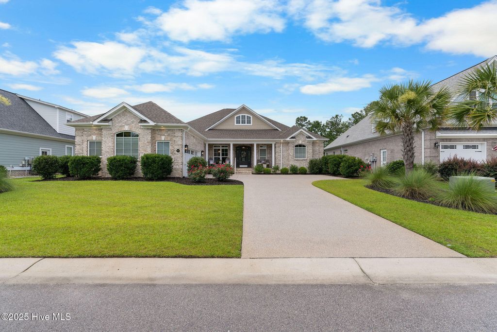 Photo of 8652 Compass Pointe West Wynd NE, Leland, NC 28451 (MLS # 100517606)
