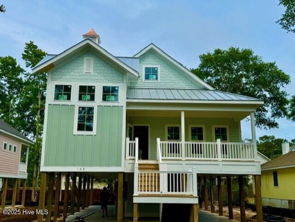 Photo of 168 NE 31st Street, Oak Island, NC 28465 (MLS # 100502884)