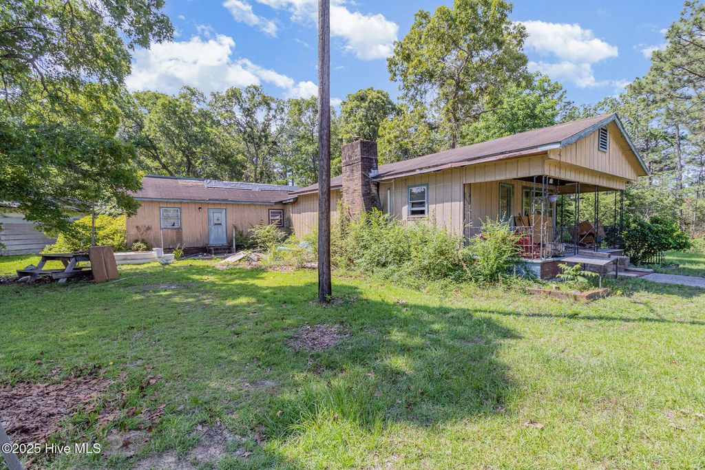 Photo of 495 Horseshoe Road, Aberdeen, NC 28315 (MLS # 100543773)