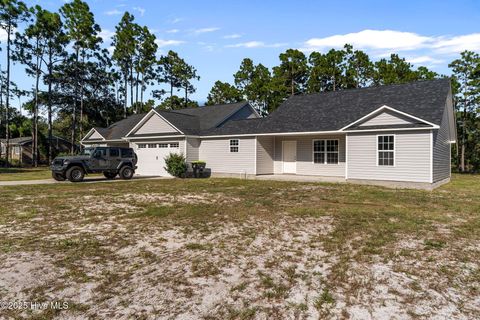 Photo of 757 Eden Drive, Southport, NC 28461 (MLS # 100530347)