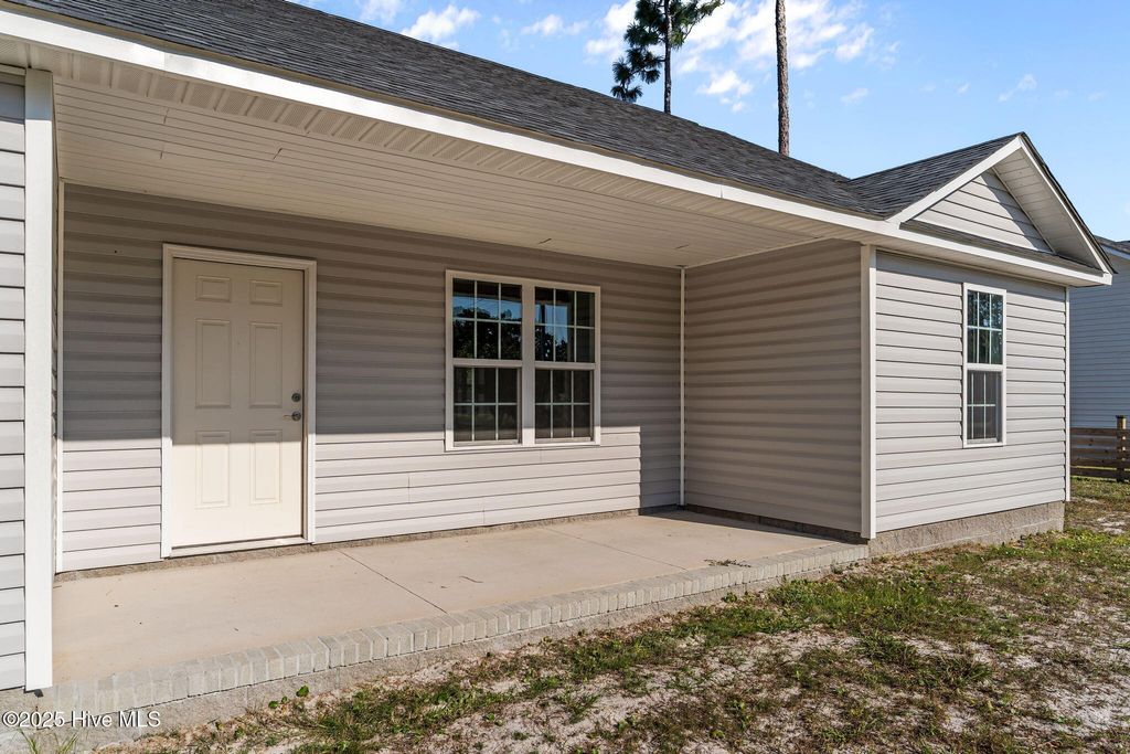 Photo of 757 Eden Drive, Southport, NC 28461 (MLS # 100530347)