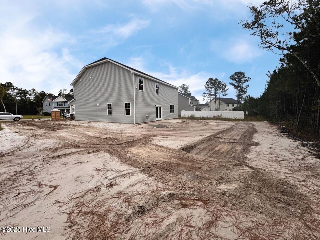 Photo of 483 Sea Captain Lane SW, Supply, NC 28462 (MLS # 100536066)
