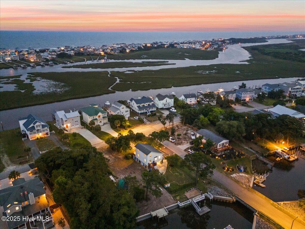 Photo of 102 E Island Drive, Oak Island, NC 28465 (MLS # 100510110)