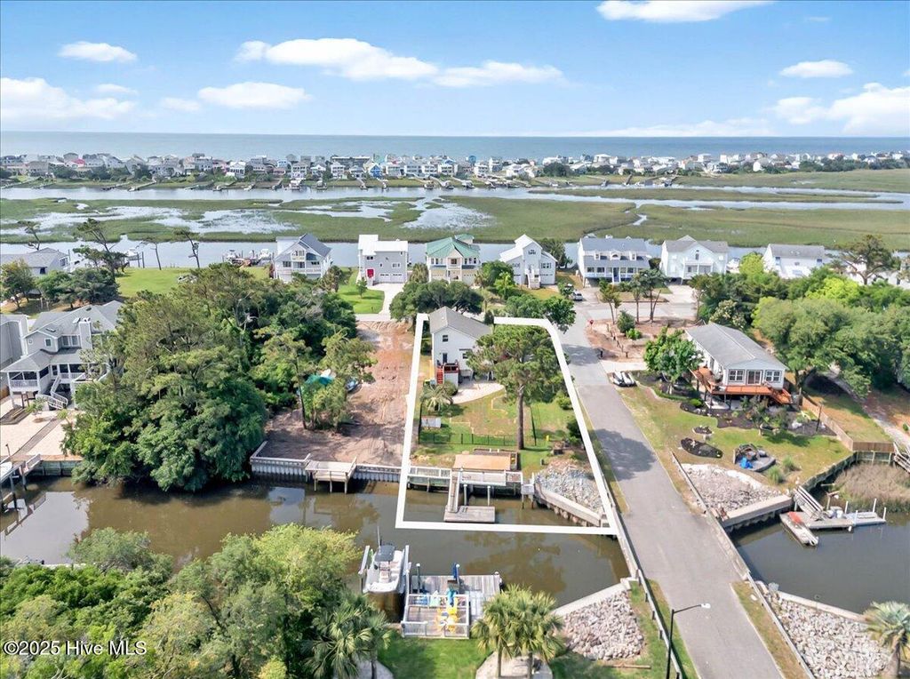 Photo of 102 E Island Drive, Oak Island, NC 28465 (MLS # 100510110)