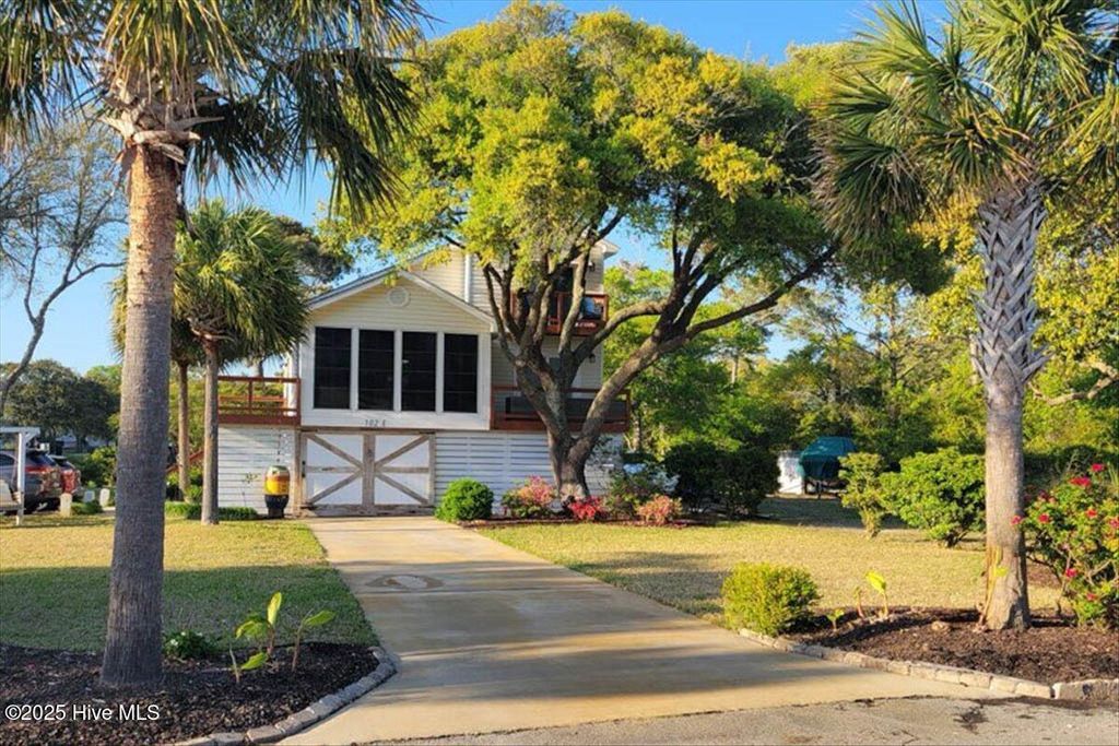 Photo of 102 E Island Drive, Oak Island, NC 28465 (MLS # 100510110)