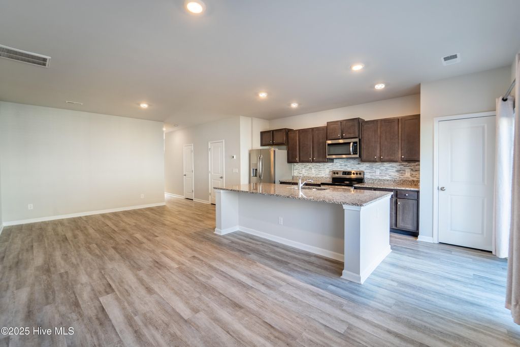 Photo of 4613 Wildaire Lane, Leland, NC 28451 (MLS # 100543067)