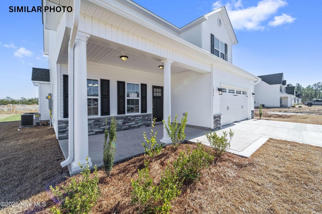 Photo of 1856 Olde Towne Pointe Boulevard, Jacksonville, NC 28546 (MLS # 100519002)