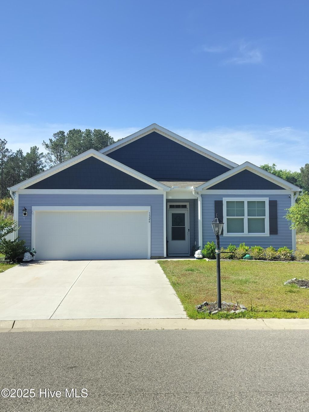 Photo of 1326 Cadbury Castle Drive SE, Bolivia, NC 28422 (MLS # 100515785)