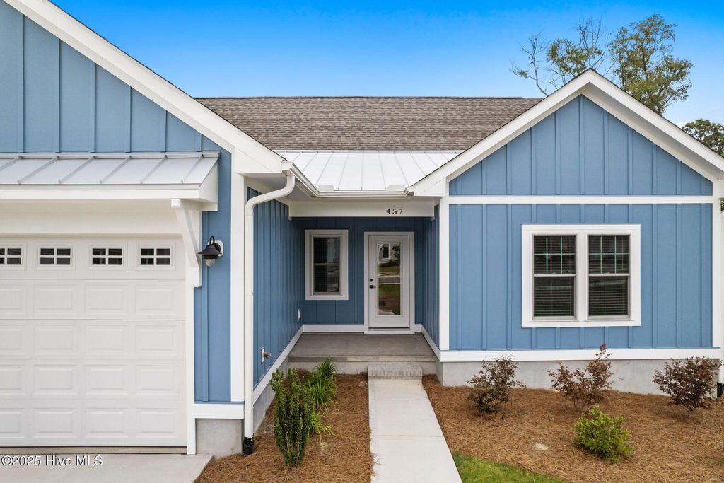 Photo of 457 Raven Glen Drive, Southport, NC 28461 (MLS # 100479579)
