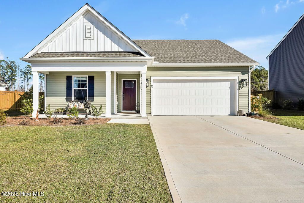 Photo of 1031 Sandy Heights Loop, Navassa, NC 28451 (MLS # 100542156)
