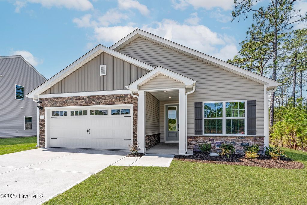 Photo of 103 S Umbrella Palm Dr Drive, Hampstead, NC 28443 (MLS # 100505543)
