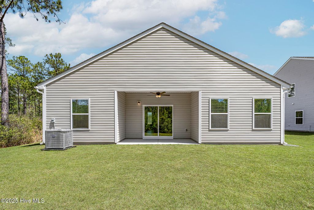 Photo of 103 S Umbrella Palm Dr Drive, Hampstead, NC 28443 (MLS # 100505543)