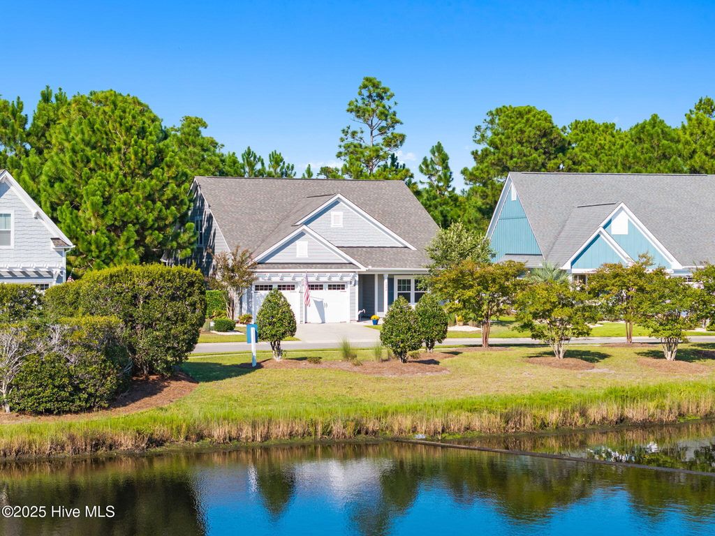 Photo of 3244 Inland Cove Drive, Southport, NC 28461 (MLS # 100530802)